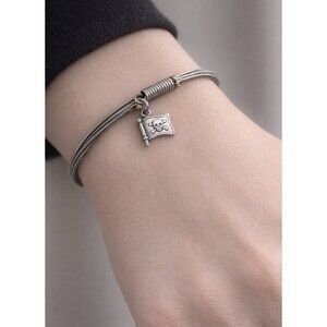 Strung Looks At Forty Authentic Guitar String Bracelet Pirate Skull Crossbones
